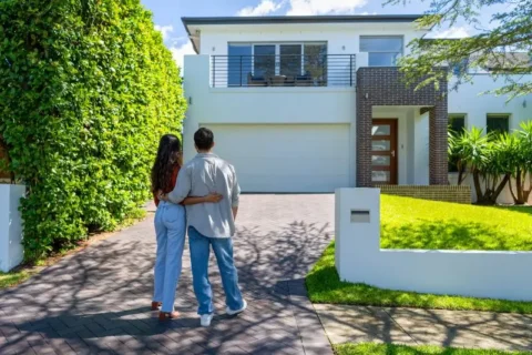 Couple admiring their new home in Texas